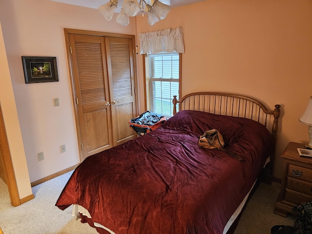 14911 Kings Ln, Ocqueoc, MI 49759 - bedroom with carpet floors and a closet