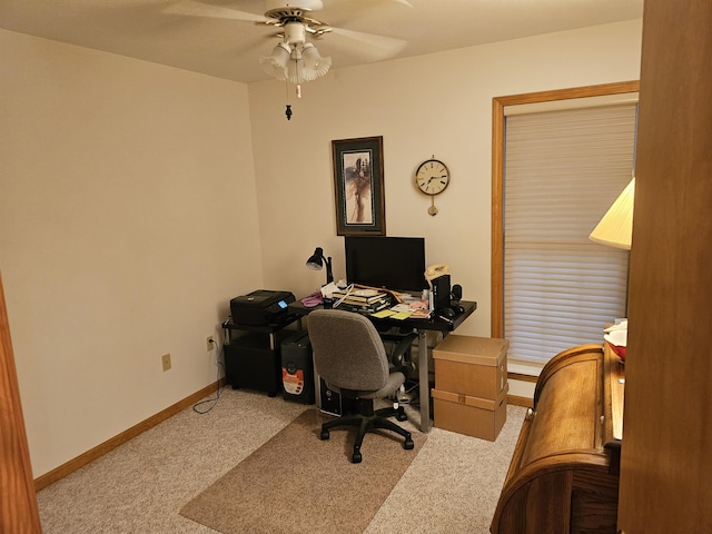 14911 Kings Ln, Ocqueoc, MI 49759 - carpeted office with a ceiling fan and baseboards