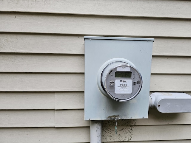 14911 Kings Ln, Ocqueoc, MI 49759 - exterior view of electric meter