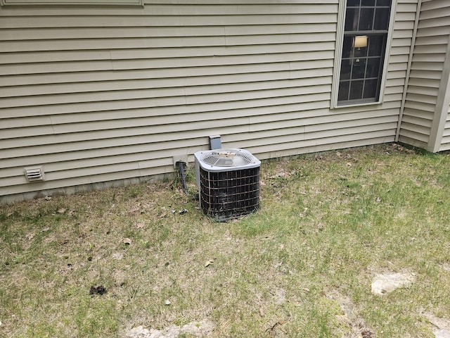 14911 Kings Ln, Ocqueoc, MI 49759 - exterior view of a cooling unit