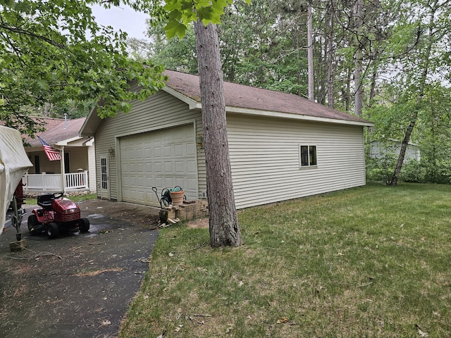 14911 Kings Ln, Ocqueoc, MI 49759 - garage featuring driveway
