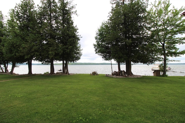 2150 Danish Landing Rd, Grayling, MI 49738 - view of green lawn with a water view