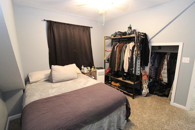 2150 Danish Landing Rd, Grayling, MI 49738 - carpeted bedroom with baseboards and a ceiling fan