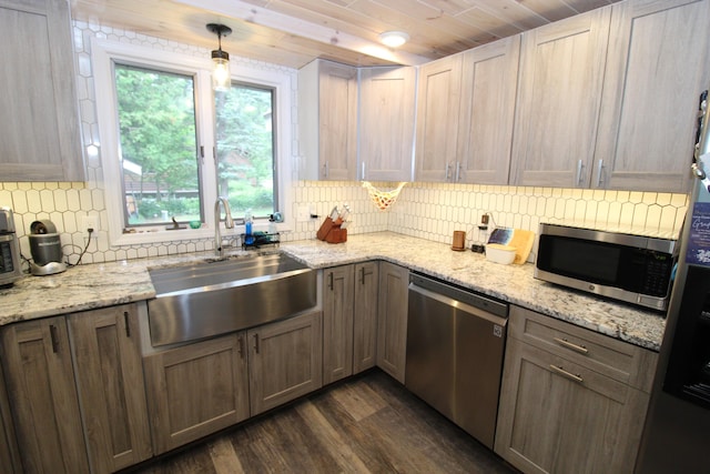 2150 Danish Landing Rd, Grayling, MI 49738 - kitchen with stainless steel appliances, dark wood-style flooring, tasteful backsplash, light stone countertops, and wood ceiling