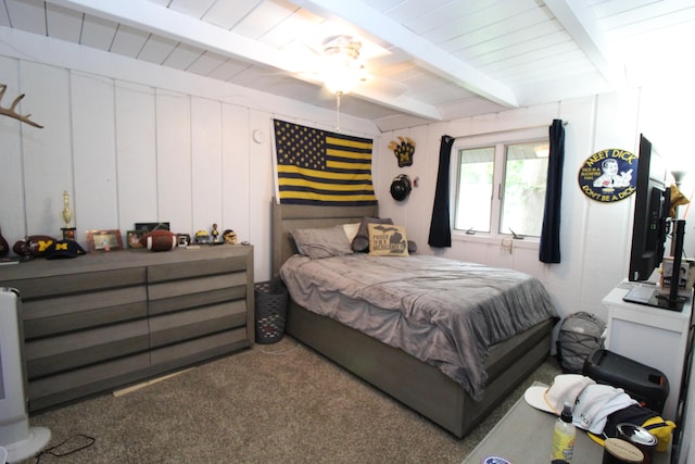 2150 Danish Landing Rd, Grayling, MI 49738 - bedroom with beam ceiling and carpet floors