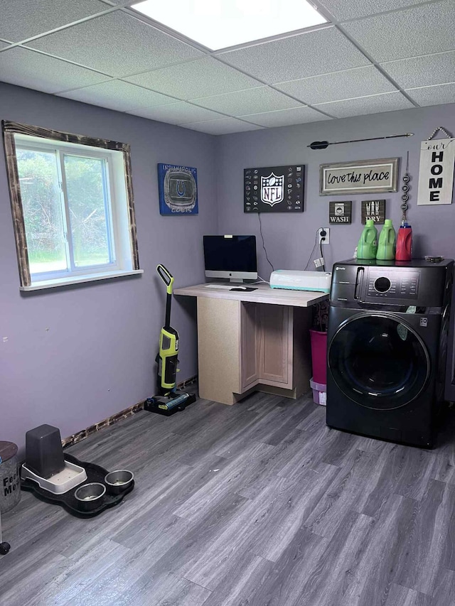 4130 Werth Rd, Alpena, MI 49707 - laundry room featuring washer / dryer, wood finished floors, cabinet space, and an office area