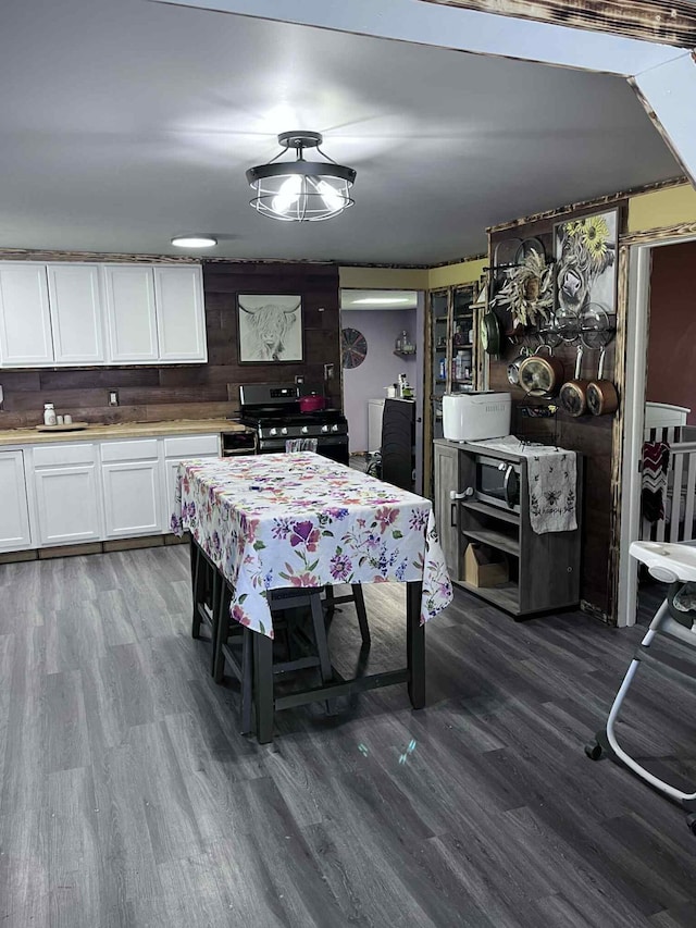 4130 Werth Rd, Alpena, MI 49707 - dining room featuring dark wood-style floors