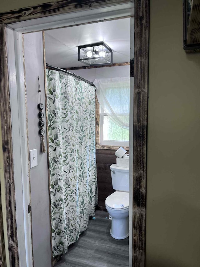 4130 Werth Rd, Alpena, MI 49707 - full bath with wood finished floors and curtained shower