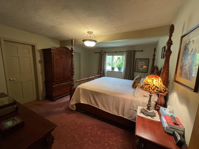 982 Shaggy Bark Ct, Gaylord, MI 49735 - bedroom with carpet flooring and a textured ceiling