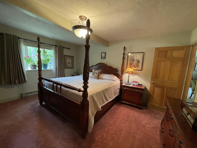 982 Shaggy Bark Ct, Gaylord, MI 49735 - bedroom with a baseboard heating unit, carpet floors, and a textured ceiling