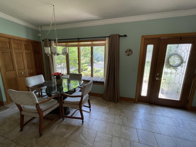 982 Shaggy Bark Ct, Gaylord, MI 49735 - dining area featuring plenty of natural light and crown molding