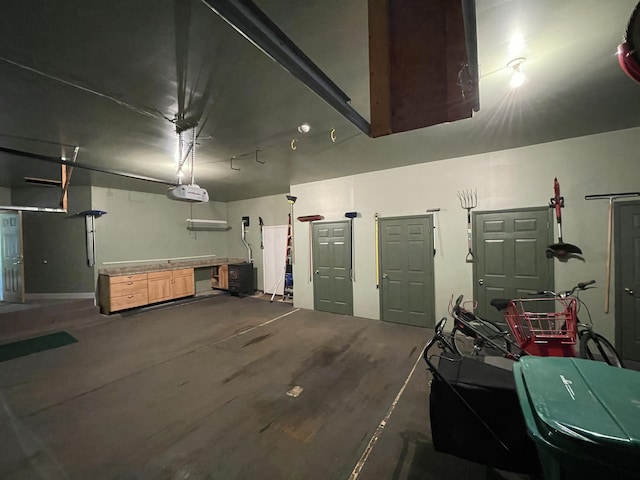 982 Shaggy Bark Ct, Gaylord, MI 49735 - garage featuring a garage door opener