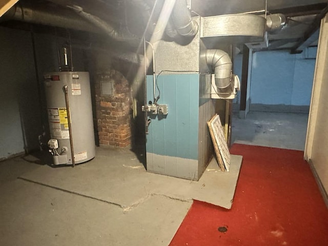 711 S 8th Ave, Alpena, MI 49707 - utility room featuring water heater and heating unit