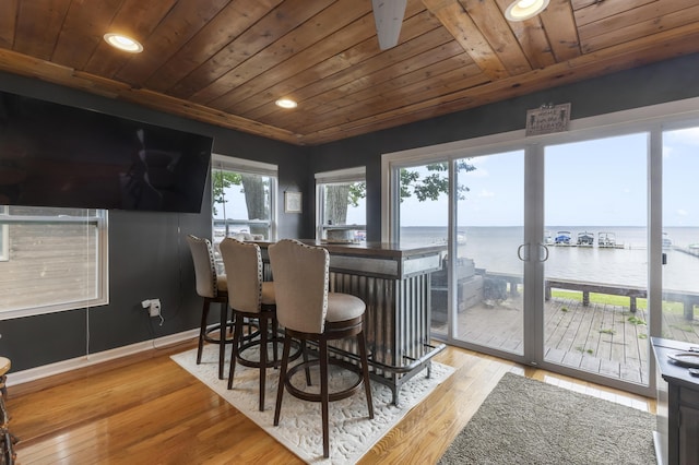 3974 W Houghton Lake Dr, Houghton Lake, MI 48629 - sunroom with a water view