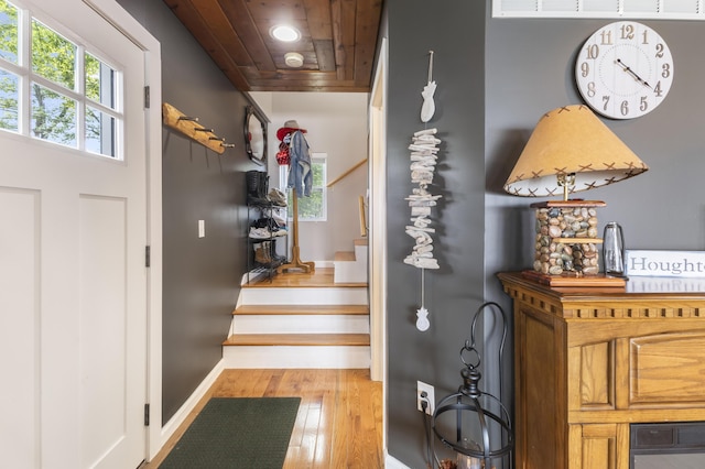 3974 W Houghton Lake Dr, Houghton Lake, MI 48629 - foyer entrance featuring light wood-type flooring and stairway