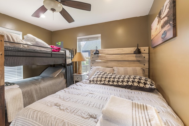 3974 W Houghton Lake Dr, Houghton Lake, MI 48629 - bedroom featuring a ceiling fan