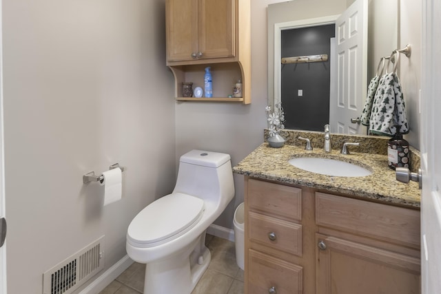 3974 W Houghton Lake Dr, Houghton Lake, MI 48629 - bathroom featuring vanity and tile patterned flooring