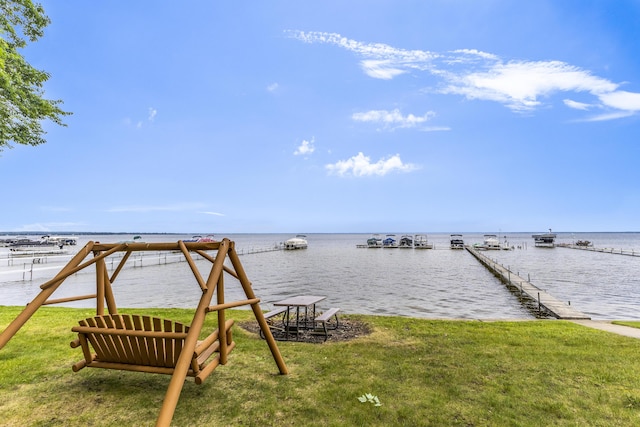 3974 W Houghton Lake Dr, Houghton Lake, MI 48629 - view of grassy yard featuring a water view