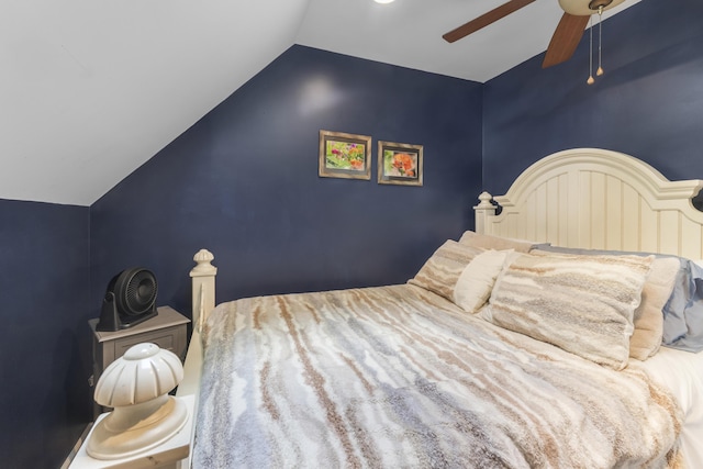 3974 W Houghton Lake Dr, Houghton Lake, MI 48629 - bedroom with vaulted ceiling and ceiling fan