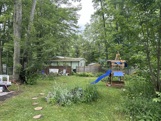 250 Mink Dr, Roscommon, MI 48653 - view of yard featuring a playground