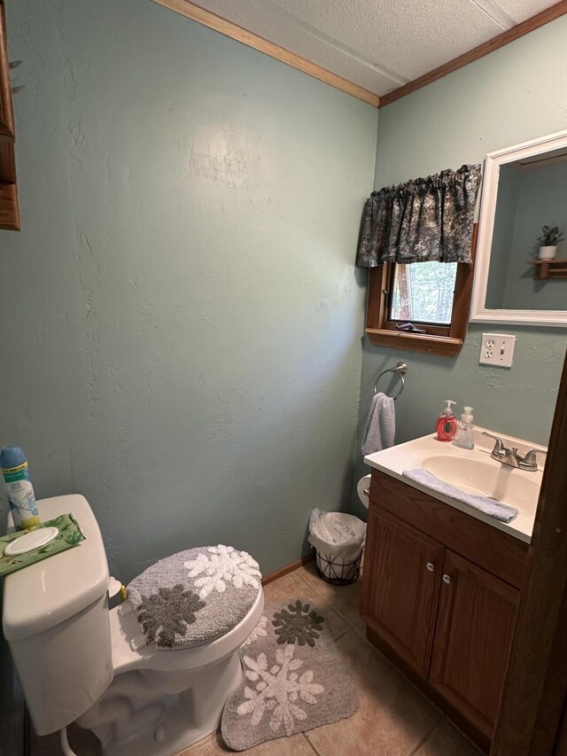 5127 Crestwood Rd, Lewiston, MI 49756 - half bathroom with vanity, tile patterned flooring, a textured ceiling, and ornamental molding