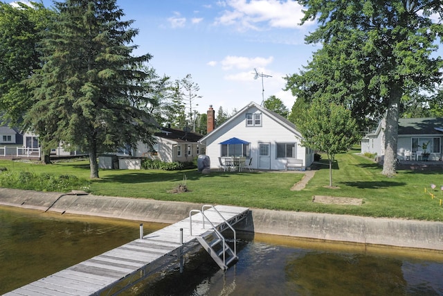 12328 W Shore Dr, Houghton Lake, MI 48629 - dock area with a lawn and a water view
