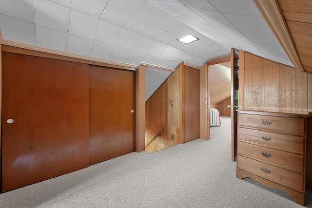 12328 W Shore Dr, Houghton Lake, MI 48629 - bonus room with carpet floors, lofted ceiling, and wooden walls