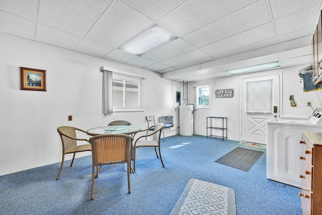 12328 W Shore Dr, Houghton Lake, MI 48629 - dining room featuring separate washer and dryer, water heater, carpet, and a drop ceiling