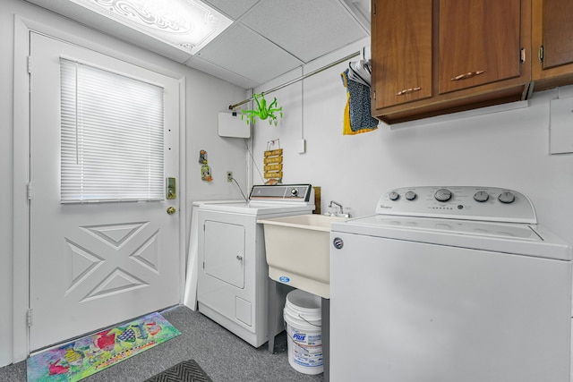 12328 W Shore Dr, Houghton Lake, MI 48629 - laundry area with separate washer and dryer and cabinet space
