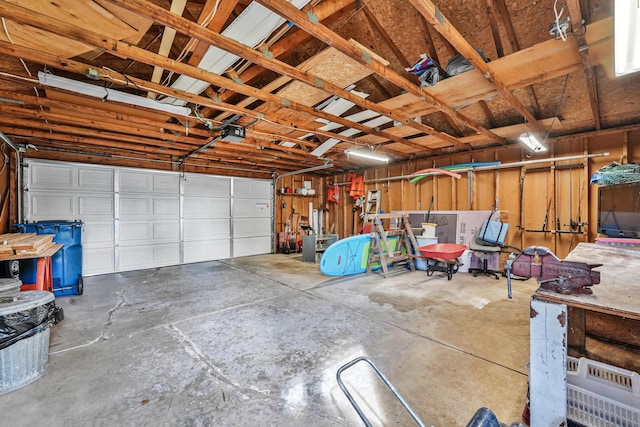 12328 W Shore Dr, Houghton Lake, MI 48629 - garage with a garage door opener