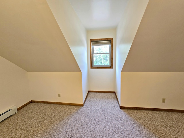 N705 Woods Rd, Saint Ignace, MI 49781 - additional living space featuring baseboard heating, carpet floors, and vaulted ceiling