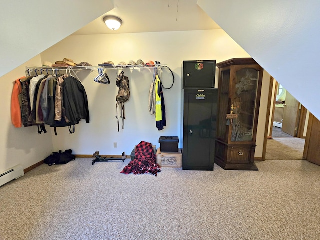 N705 Woods Rd, Saint Ignace, MI 49781 - carpeted bedroom featuring baseboards and a baseboard radiator