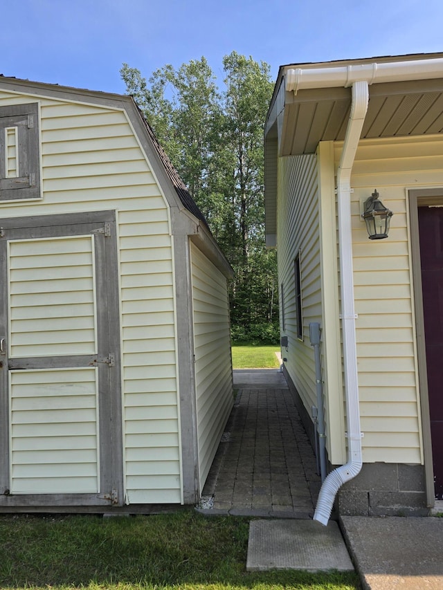 N705 Woods Rd, Saint Ignace, MI 49781 - view of home's exterior featuring a shed