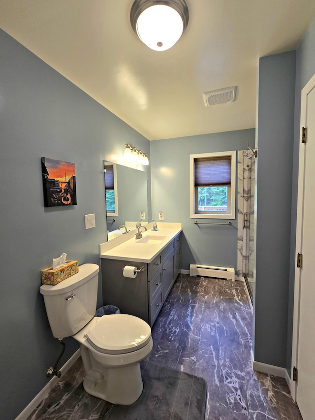 N705 Woods Rd, Saint Ignace, MI 49781 - bathroom with a baseboard heating unit, marble look tile flooring, vanity, and curtained shower