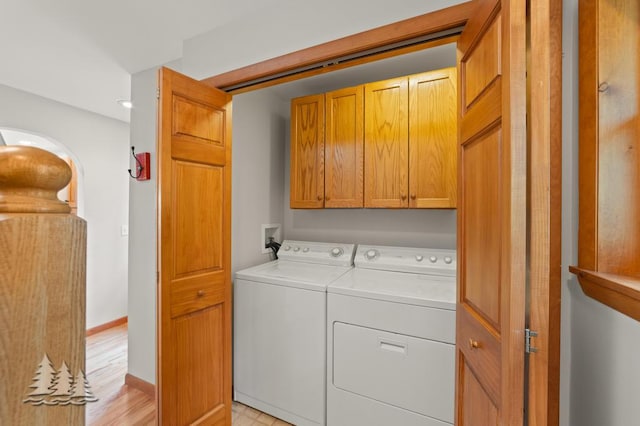 6609 Honey Ln, Johannesburg, MI 49751 - washroom with cabinet space and washing machine and clothes dryer