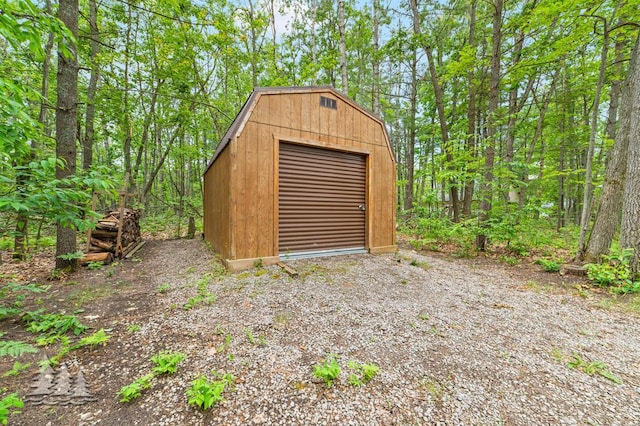 6609 Honey Ln, Johannesburg, MI 49751 - garage featuring a shed