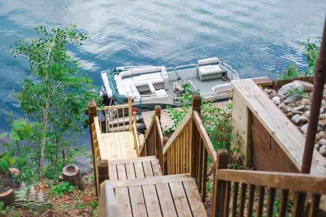 6609 Honey Ln, Johannesburg, MI 49751 - wooden terrace with a water view and a dock