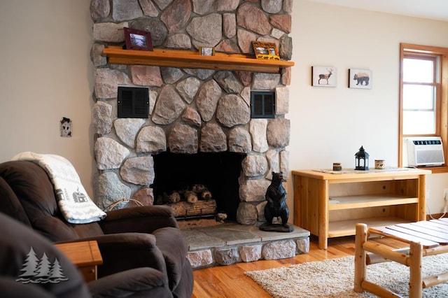 6609 Honey Ln, Johannesburg, MI 49751 - living area featuring a fireplace and wood finished floors