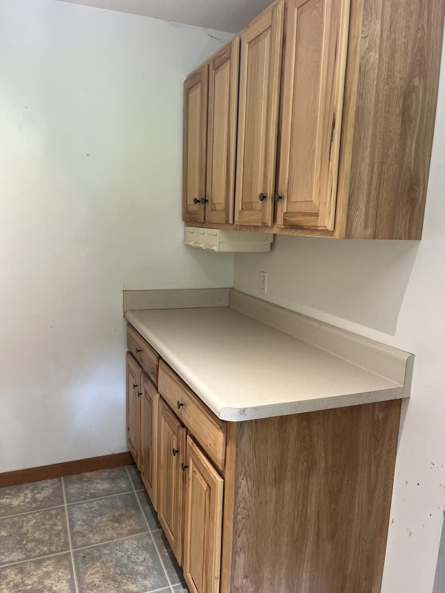 2359 Watson Hills Trl, Vanderbilt, MI 49795 - kitchen with baseboards and light countertops