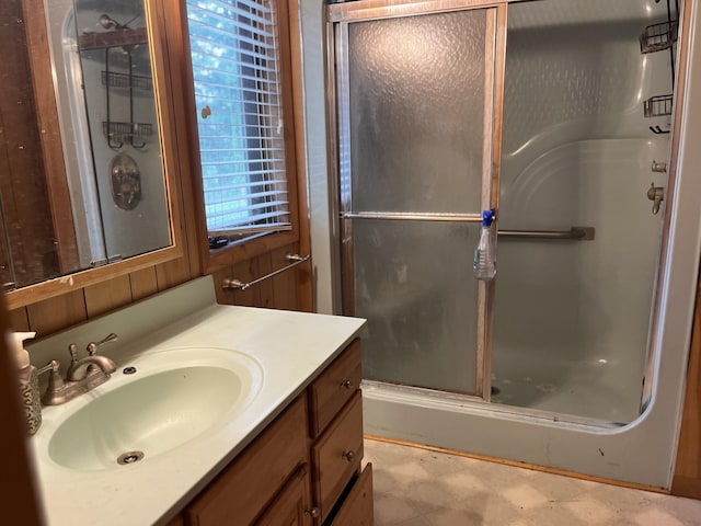 2359 Watson Hills Trl, Vanderbilt, MI 49795 - bathroom featuring a shower stall, vanity, and tile patterned floors