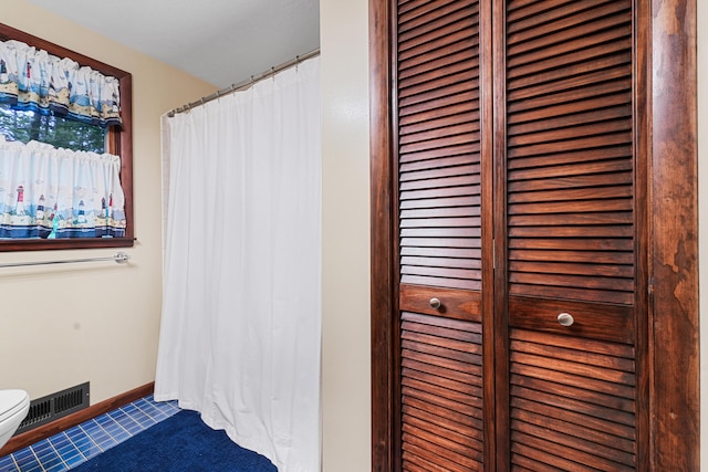 120 Clyde St, Roscommon, MI 48653 - full bathroom with tile patterned flooring, a closet, and curtained shower