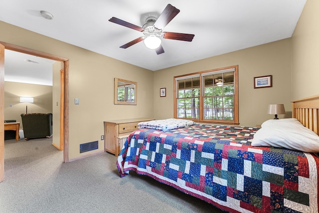 120 Clyde St, Roscommon, MI 48653 - carpeted bedroom with ceiling fan and baseboards