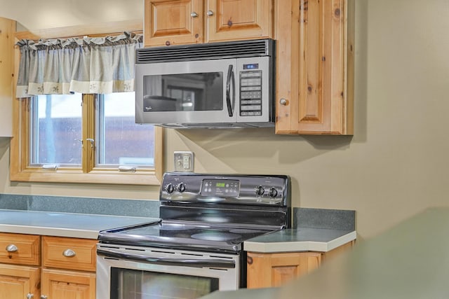 120 Clyde St, Roscommon, MI 48653 - kitchen with appliances with stainless steel finishes