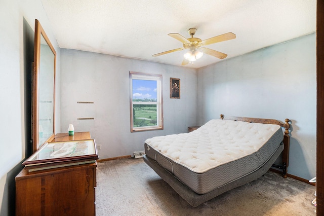 1680 W Huffman Lake Rd, Vanderbilt, MI 49795 - carpeted bedroom with baseboards and ceiling fan