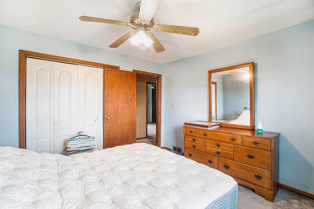 1680 W Huffman Lake Rd, Vanderbilt, MI 49795 - bedroom with a closet, light colored carpet, and ceiling fan