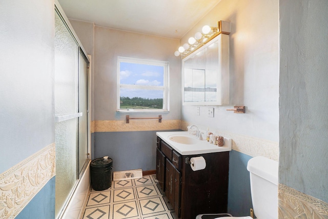 1680 W Huffman Lake Rd, Vanderbilt, MI 49795 - bathroom with vanity, shower / bath combination with glass door, and tile patterned flooring