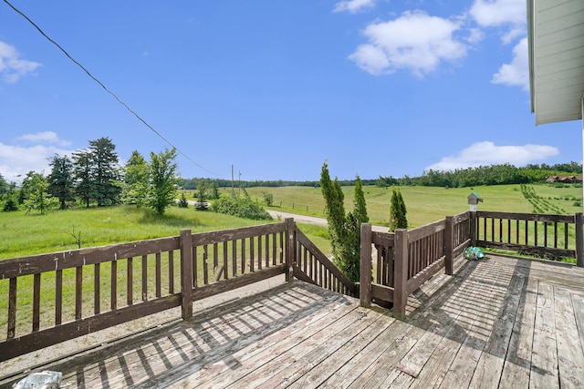 1680 W Huffman Lake Rd, Vanderbilt, MI 49795 - wooden terrace with a view of rural / pastoral area and a lawn