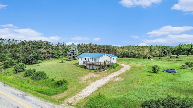 1680 W Huffman Lake Rd, Vanderbilt, MI 49795 - view from above of property with a heavily wooded area