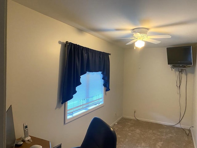 140 Oriole Dr, Alpena, MI 49707 - carpeted home office with ceiling fan and baseboards