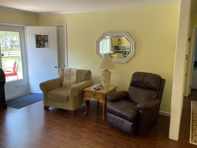 3350 Woodcrest Dr, Lewiston, MI 49756 - living area with wood finished floors and ornamental molding